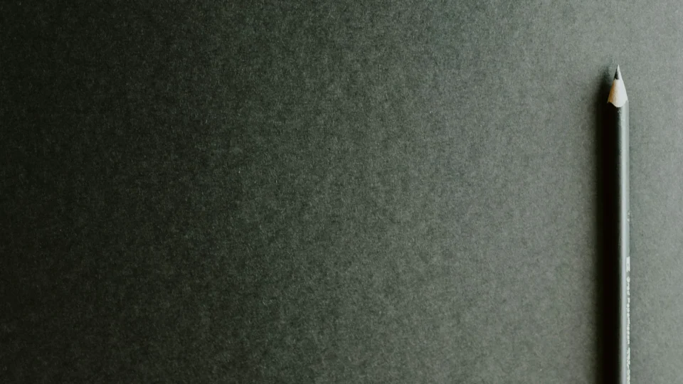 pen on gray background