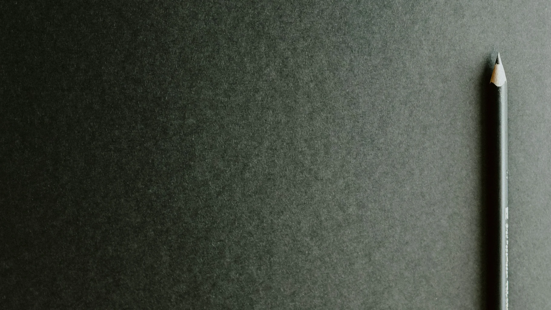pen on gray background